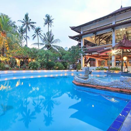 Puri Naga Beachfront Cottages Легиан Экстерьер фото