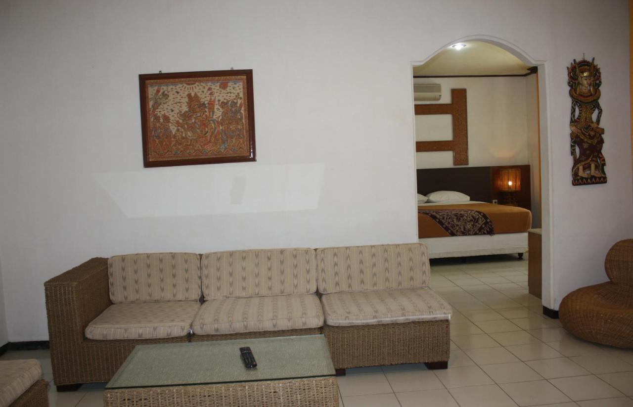 Puri Naga Beachfront Cottages Легиан Номер фото