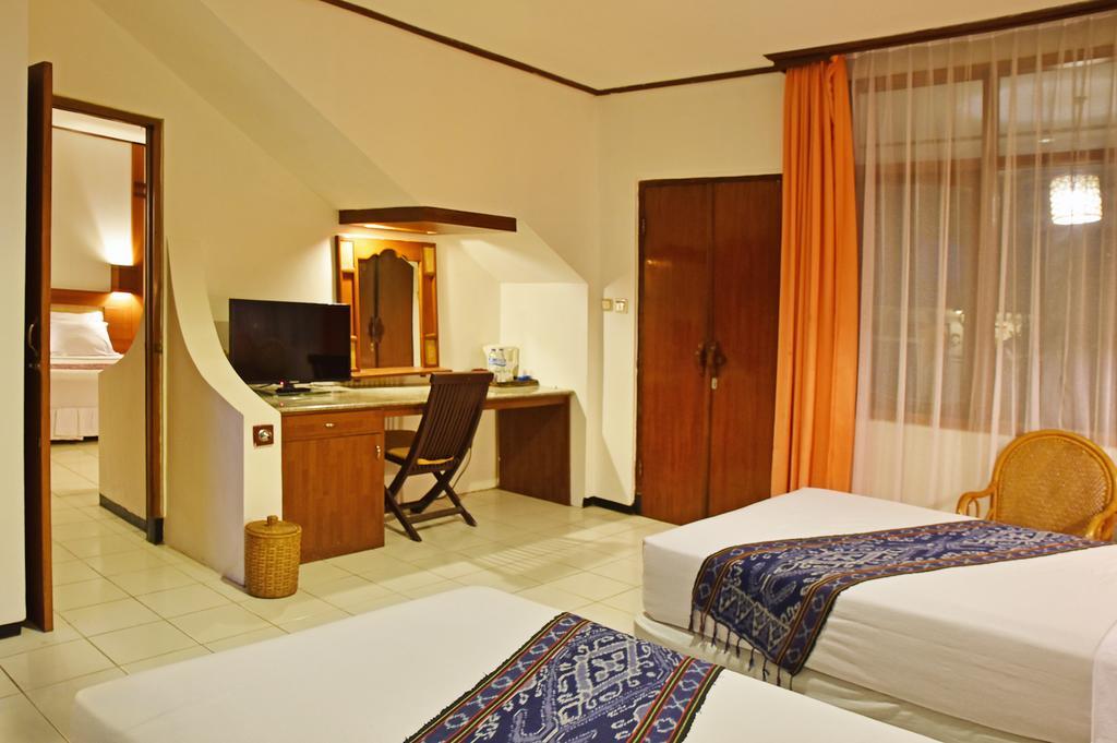 Puri Naga Beachfront Cottages Легиан Экстерьер фото