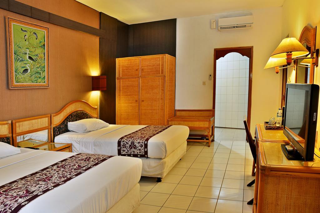 Puri Naga Beachfront Cottages Легиан Экстерьер фото