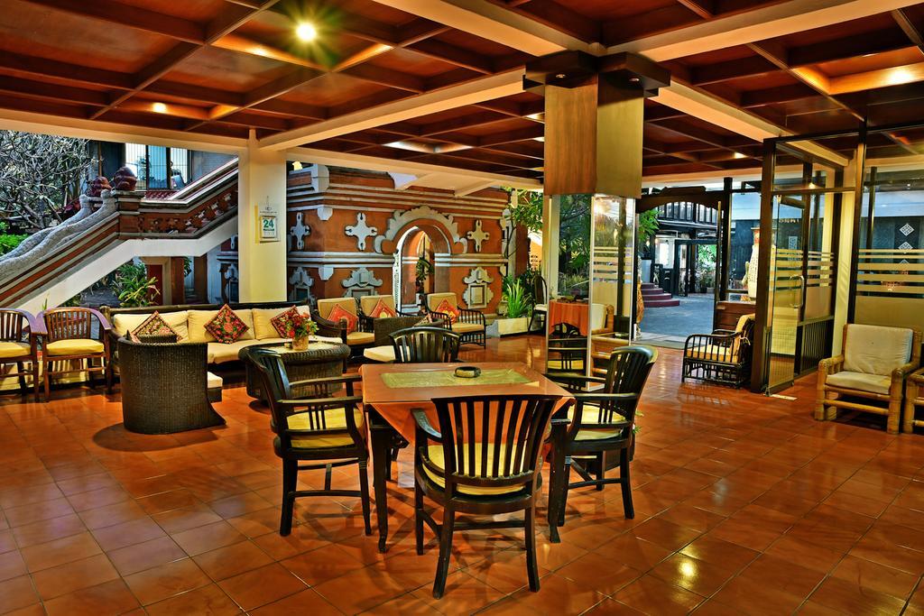 Puri Naga Beachfront Cottages Легиан Экстерьер фото