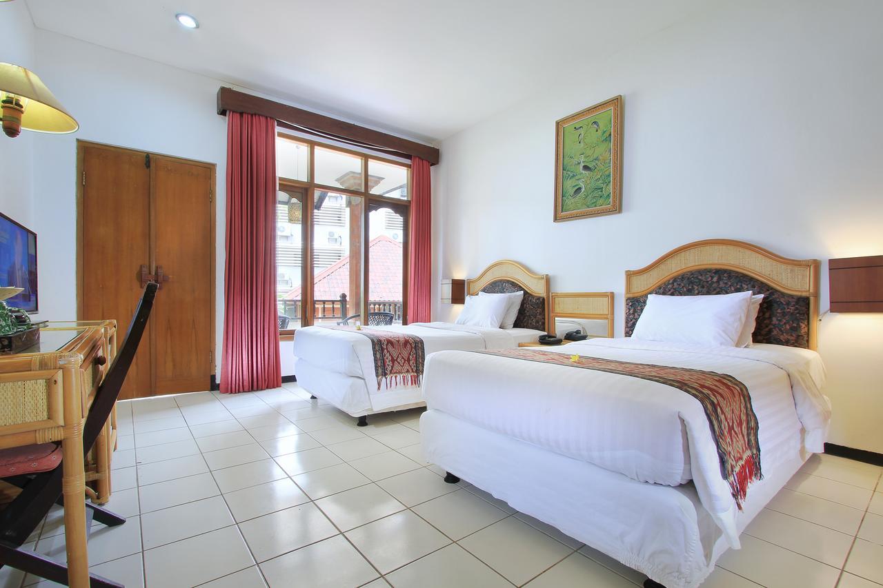 Puri Naga Beachfront Cottages Легиан Экстерьер фото