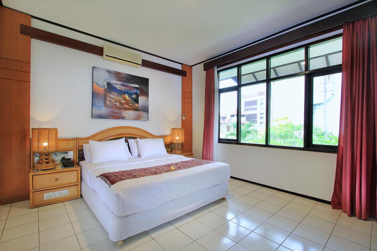 Puri Naga Beachfront Cottages Легиан Экстерьер фото