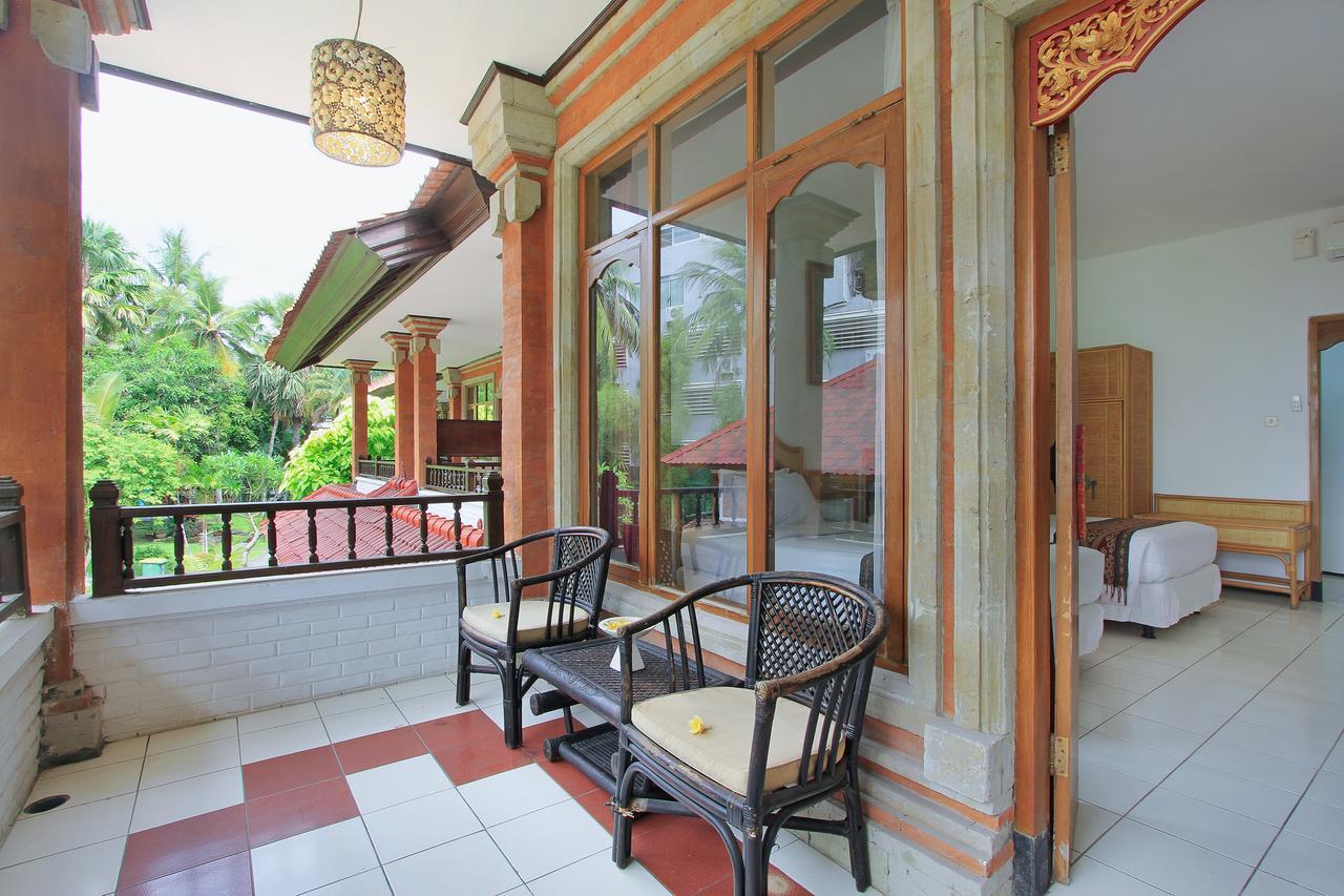 Puri Naga Beachfront Cottages Легиан Экстерьер фото
