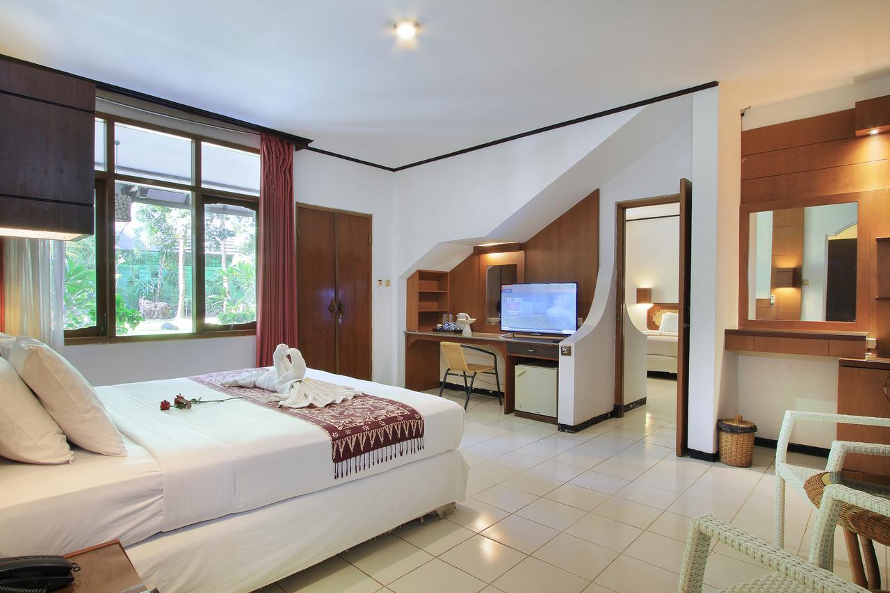 Puri Naga Beachfront Cottages Легиан Экстерьер фото