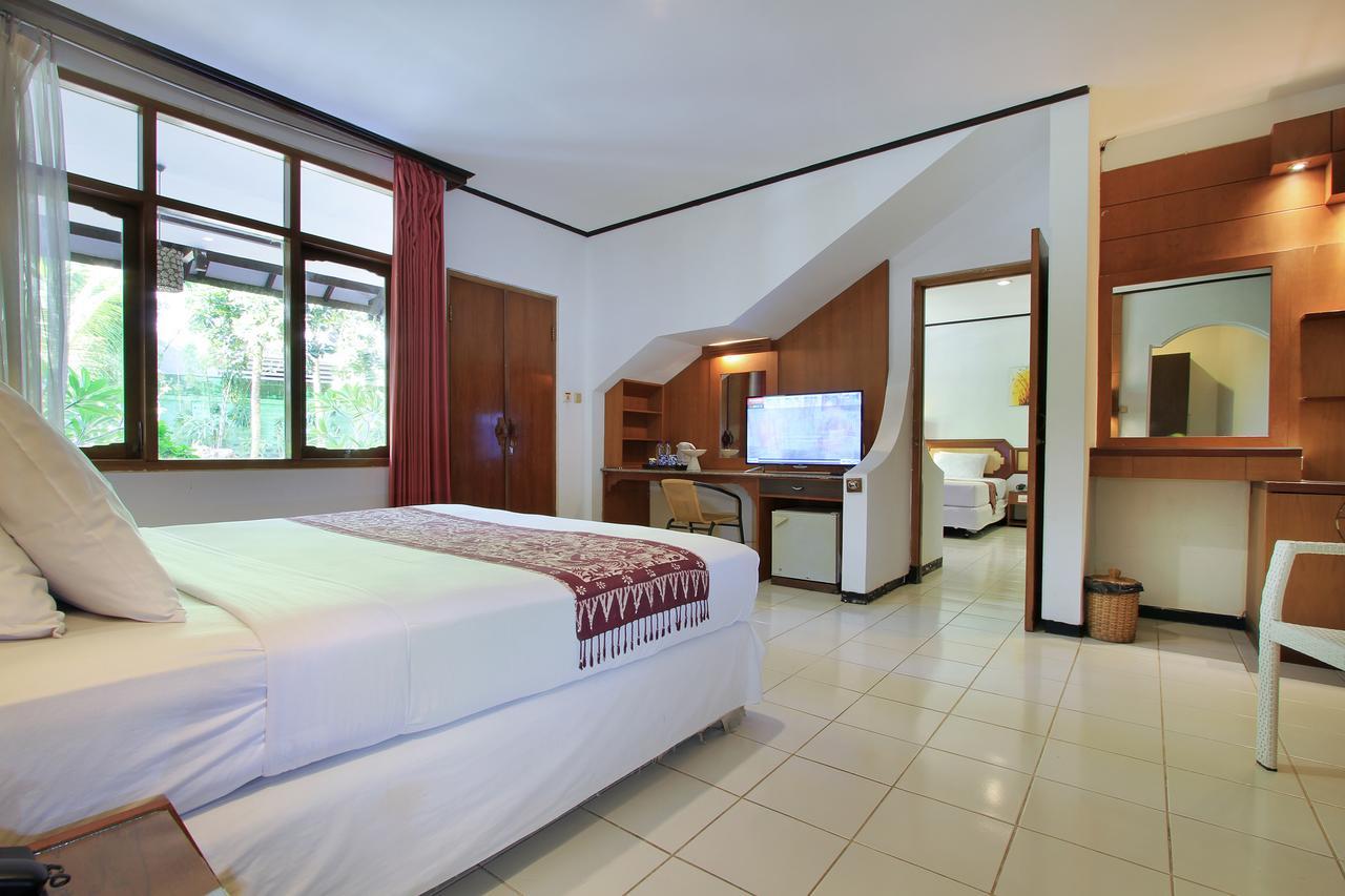 Puri Naga Beachfront Cottages Легиан Экстерьер фото