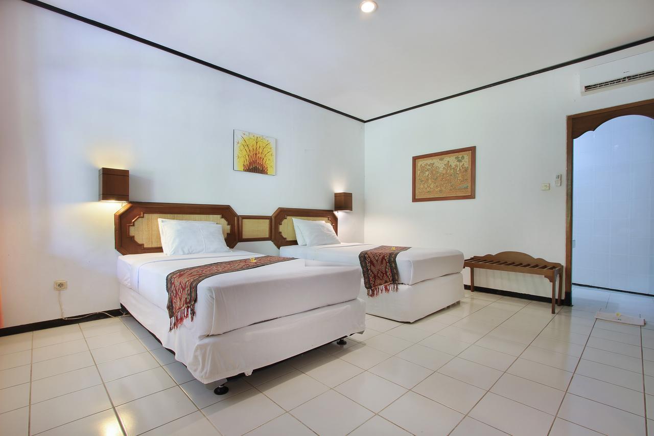 Puri Naga Beachfront Cottages Легиан Экстерьер фото