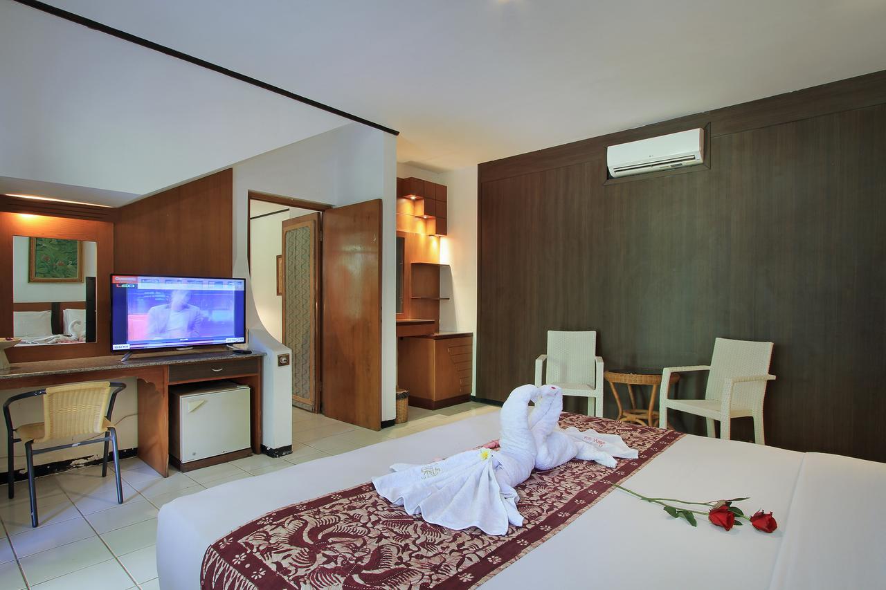 Puri Naga Beachfront Cottages Легиан Экстерьер фото