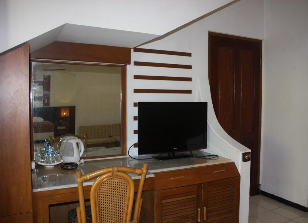 Puri Naga Beachfront Cottages Легиан Номер фото
