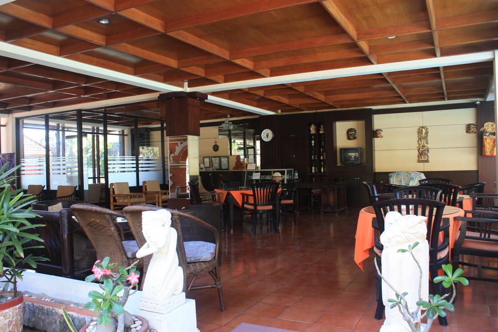Puri Naga Beachfront Cottages Легиан Экстерьер фото