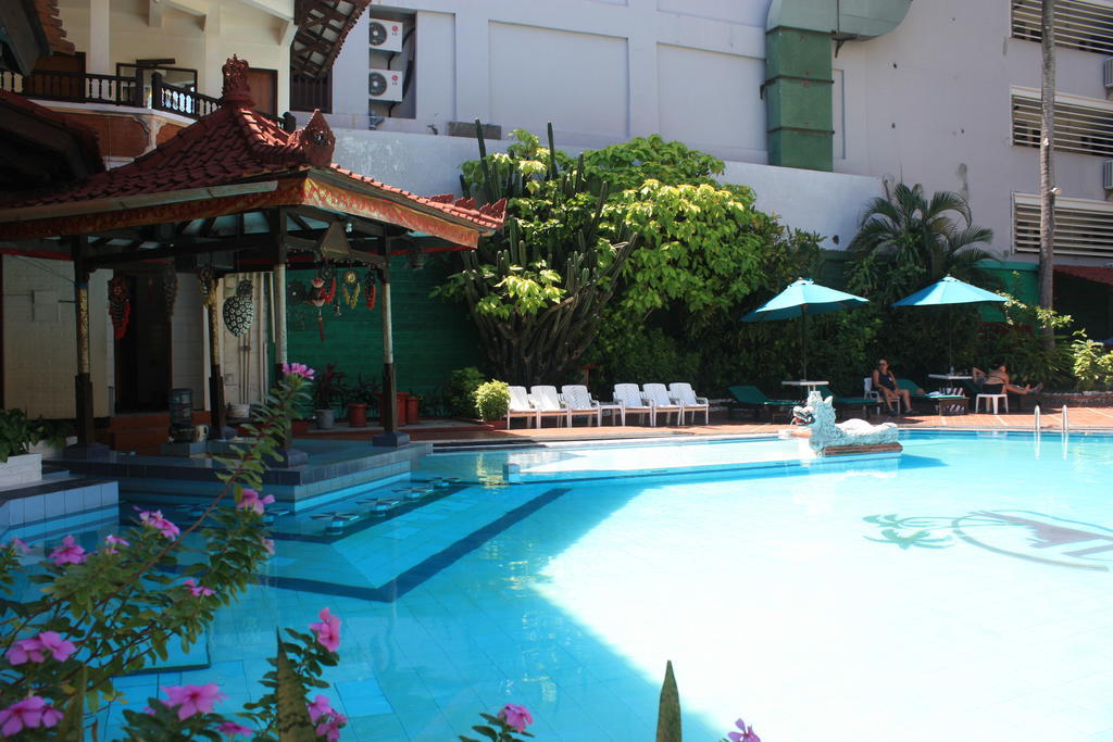 Puri Naga Beachfront Cottages Легиан Экстерьер фото