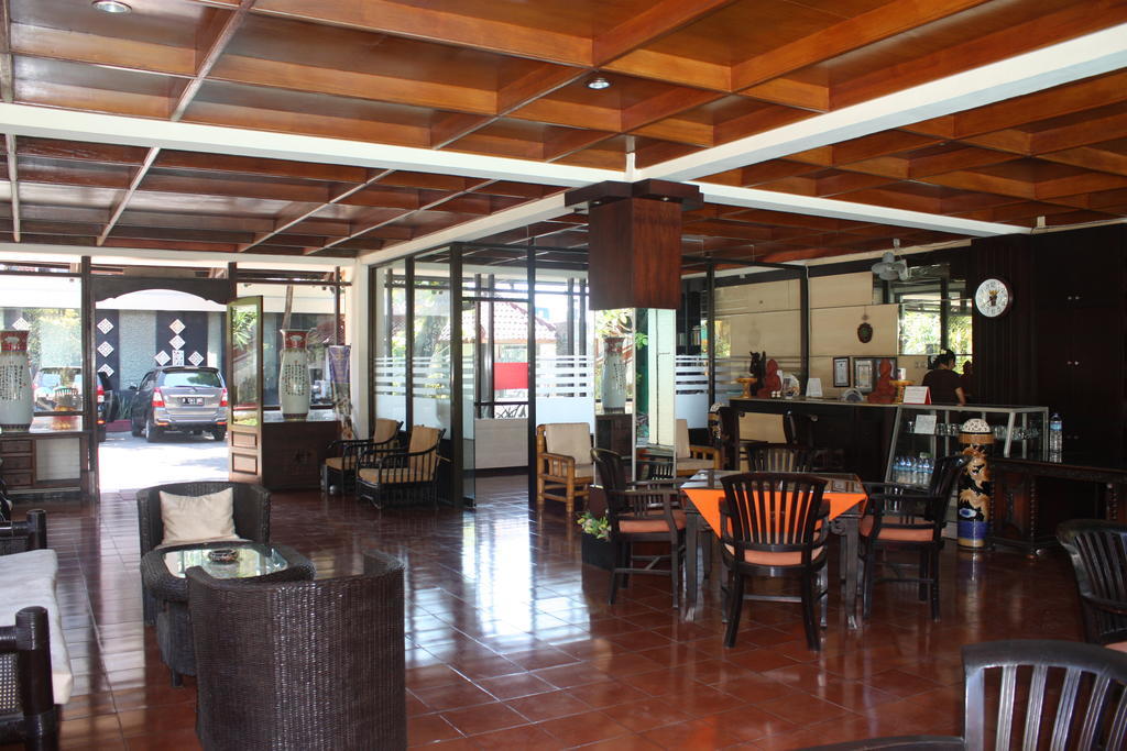 Puri Naga Beachfront Cottages Легиан Экстерьер фото